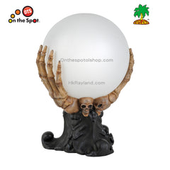 Crystal Ball On Skeleton Hand