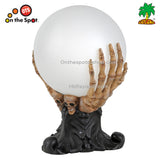 Crystal Ball On Skeleton Hand